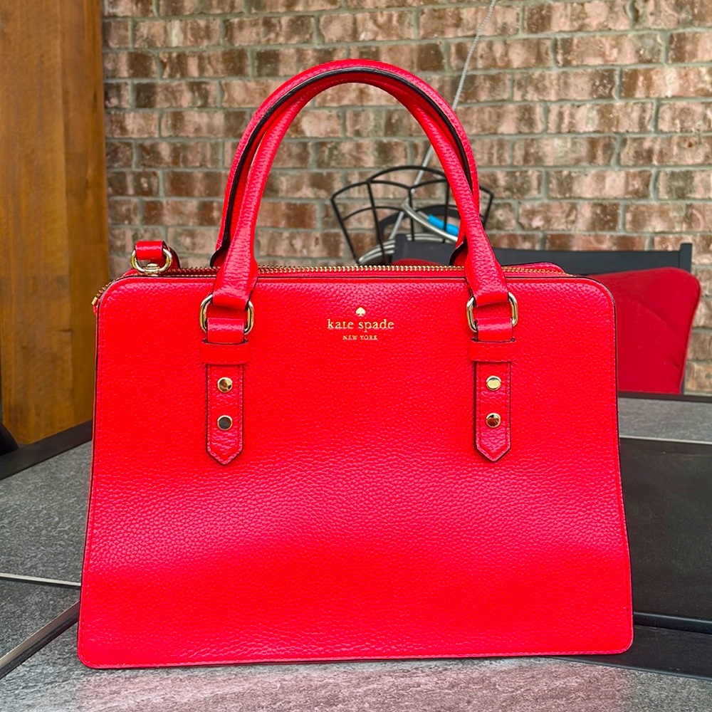 Kate Spade Mulberry bag. Comes with long strap inside. Super stylish.
